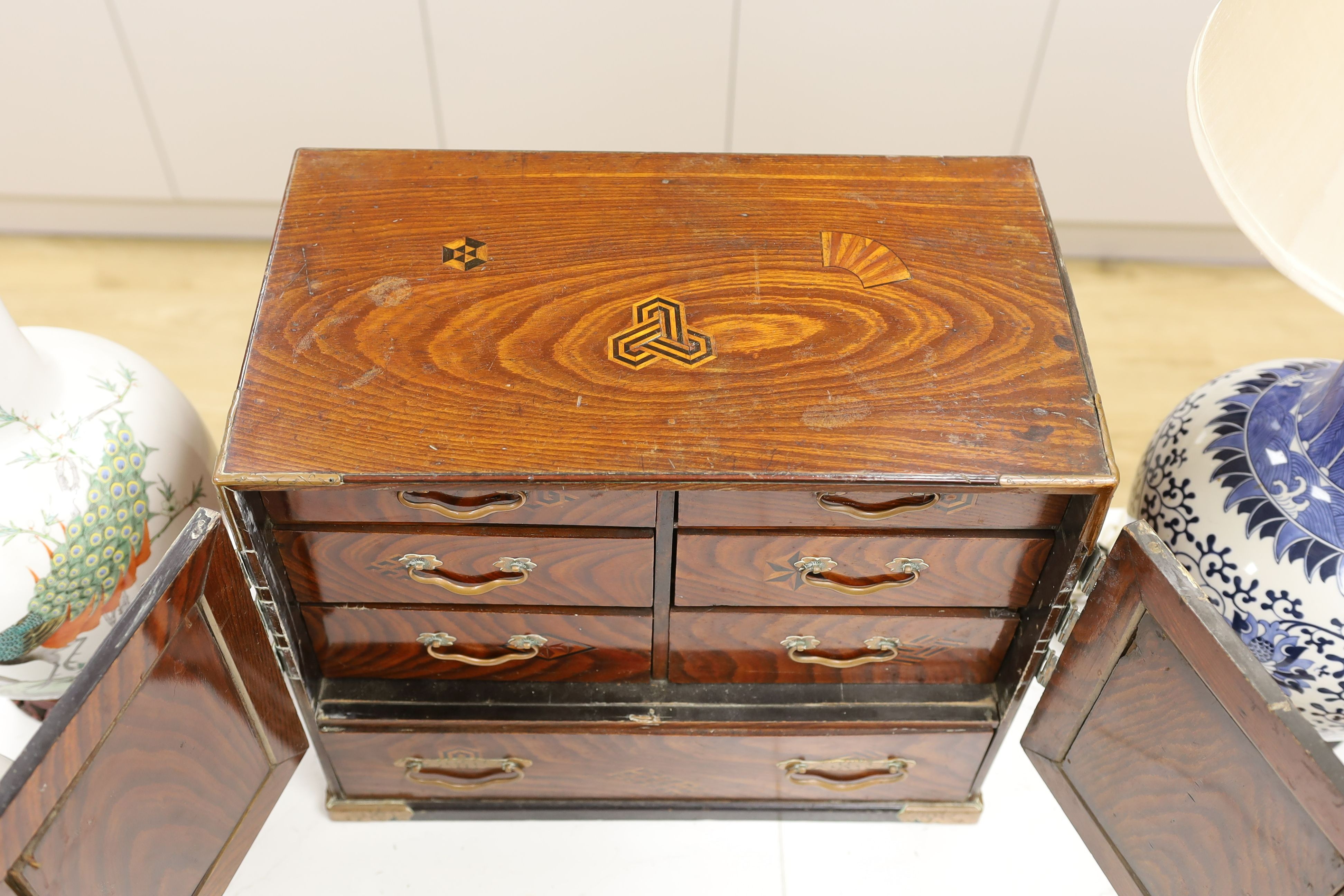 A Japanese Hakone ware brass inlaid wooden cabinet - 41cm tall